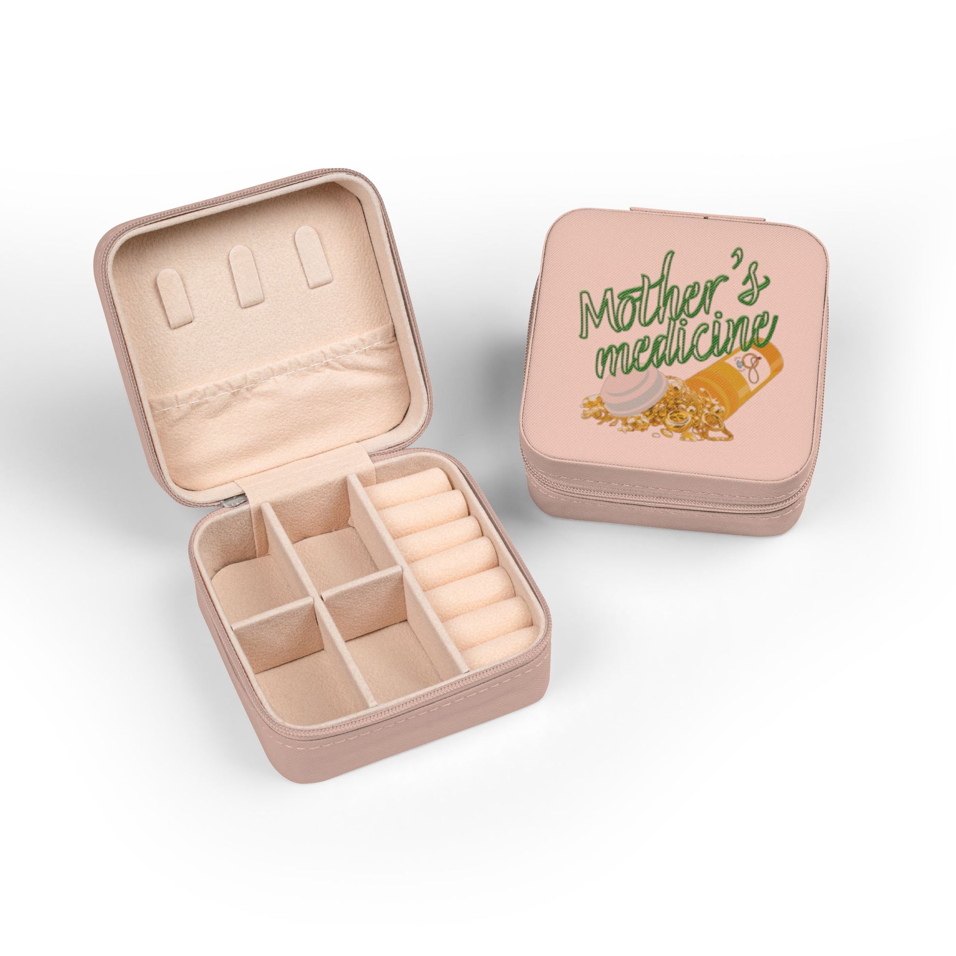 Pink jewelry box open, showing compartments, with "Mother's Medicine" on closed lid.