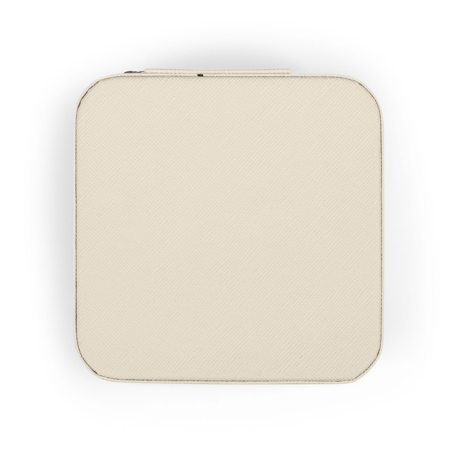 Cream-colored square jewelry box with textured surface and zipper closure.