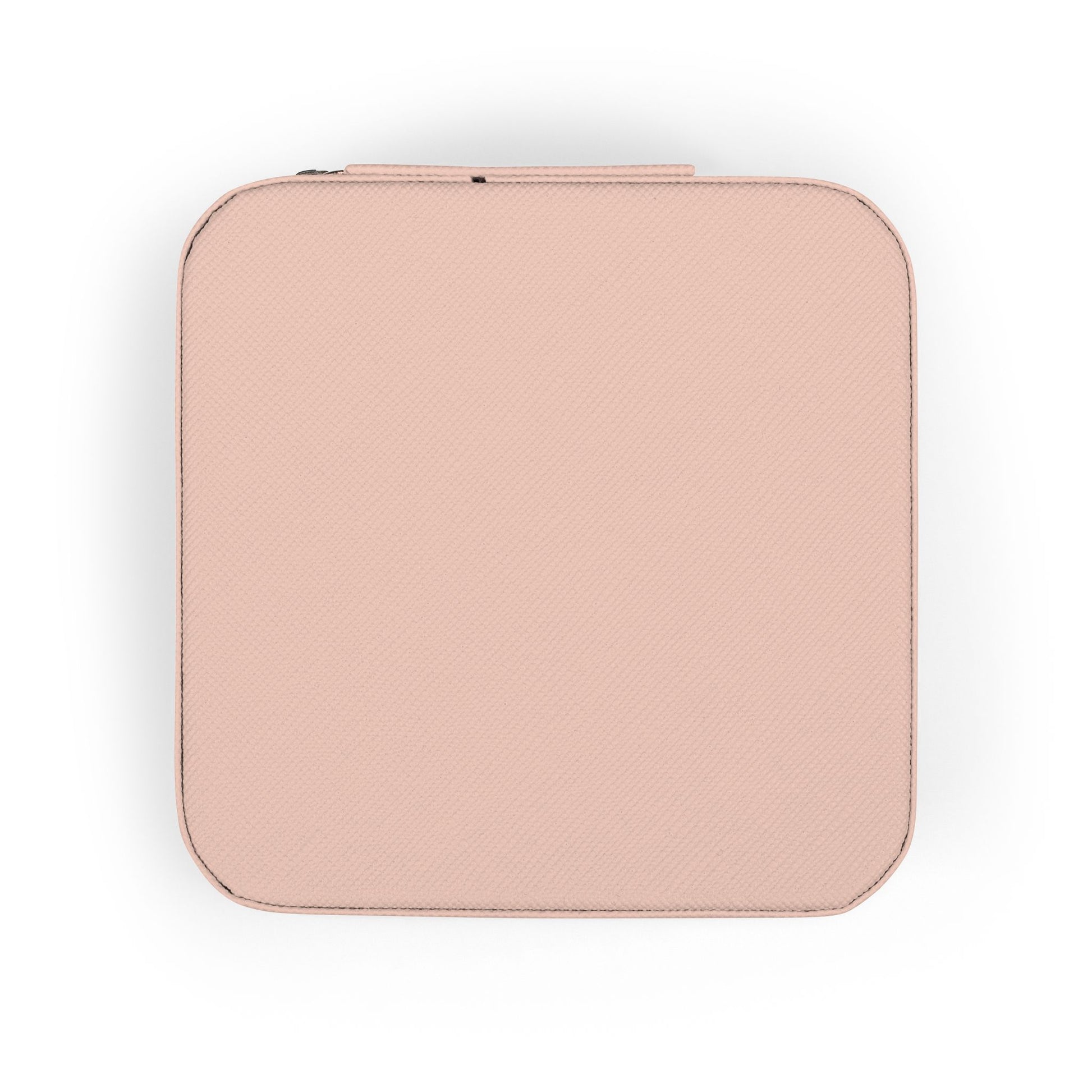 Pink textured square jewelry case with zipper.
