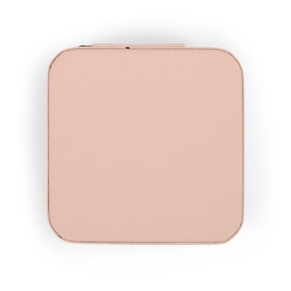 Pink textured square jewelry case with zipper.