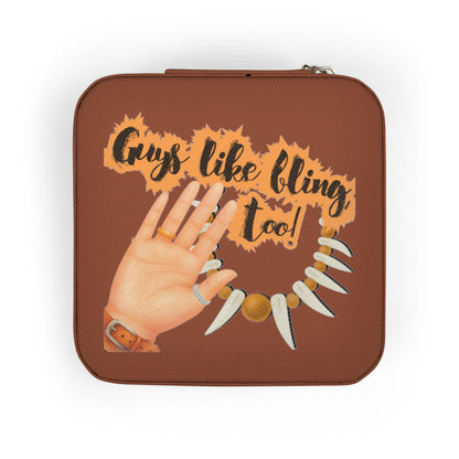 Brown jewelry box with "Guys like bling too!" text and hand with necklaces.
