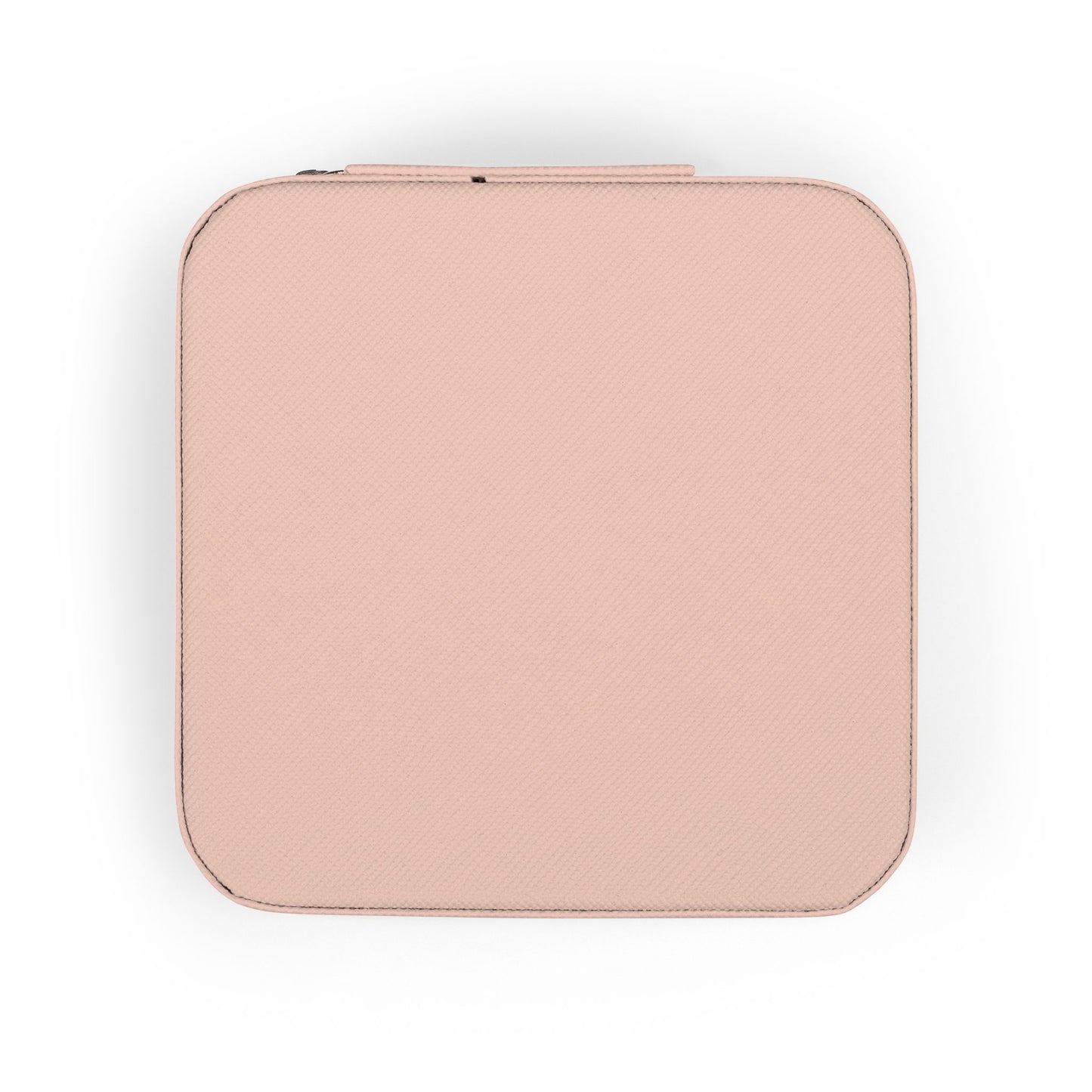 Light pink square case with textured surface and zipper closure.